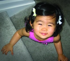 Young girl smiling at camera